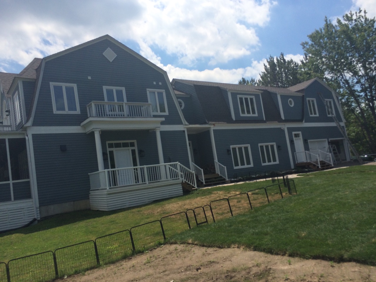 Wood siding by Muskoka Exteriors