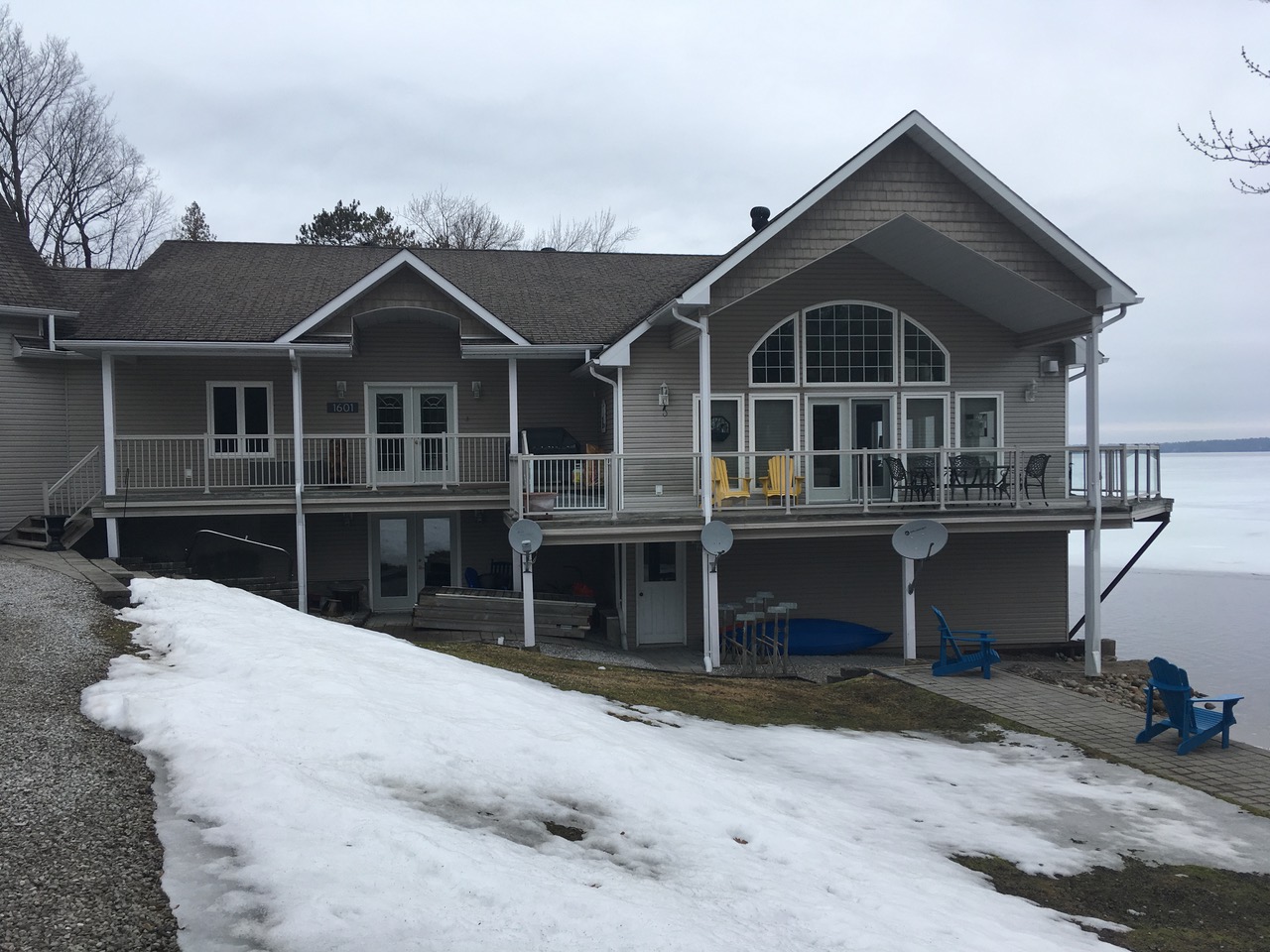 Grey Vinyl Siding by Muskoka Exteriors on Lake Muskoka